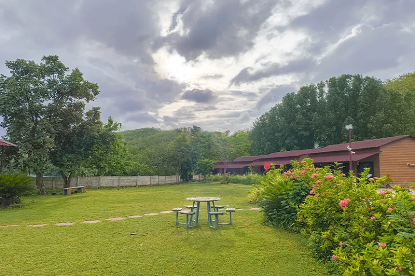 Statue of Unity Tent City during monsoon season with lush greenery